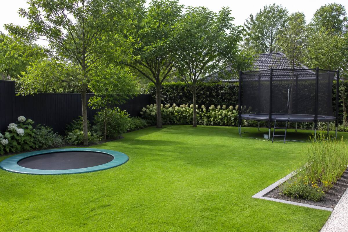 Inground of opbouw trampoline: welke past het beste in jouw tuin?